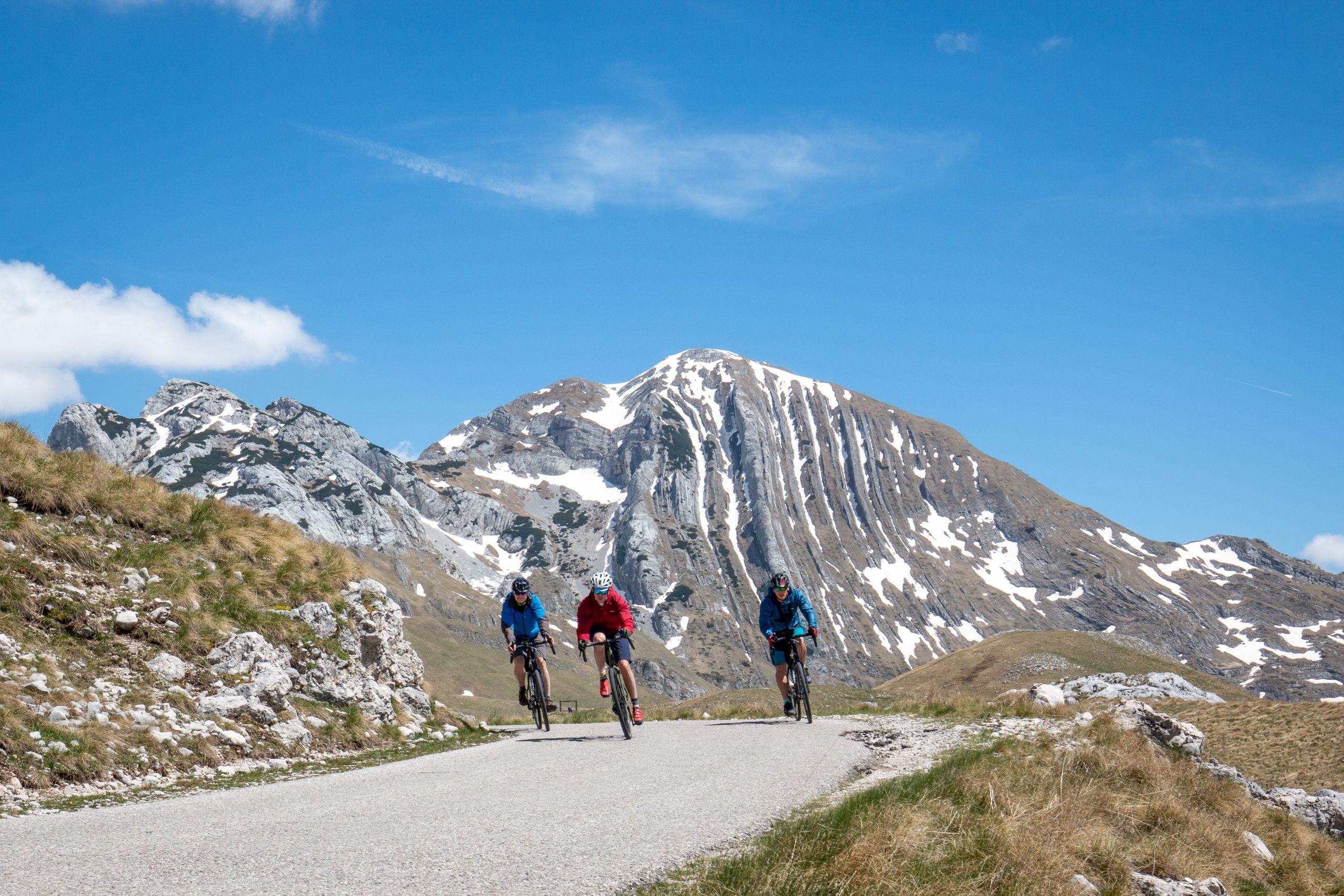 TransDinarica-cycle-route-montenegro-sedlo-pass_matevz-hribar three cyclists on the montenegro sedlo pass