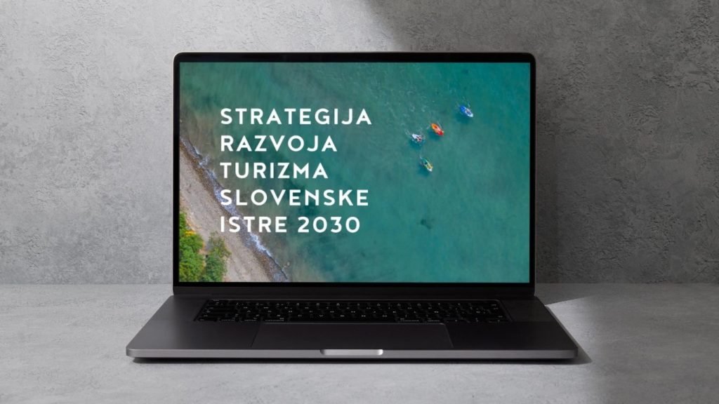 laptop screen on a gray table