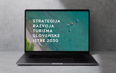 laptop screen on a gray table